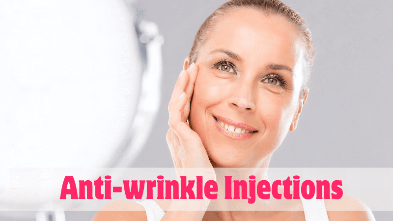 Woman touching her face with a smile, promoting her positive experience with anti-wrinkle injections.